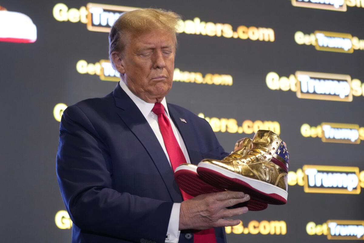 Donald Trump pitches 9 branded shoes at ‘Sneaker Con’.