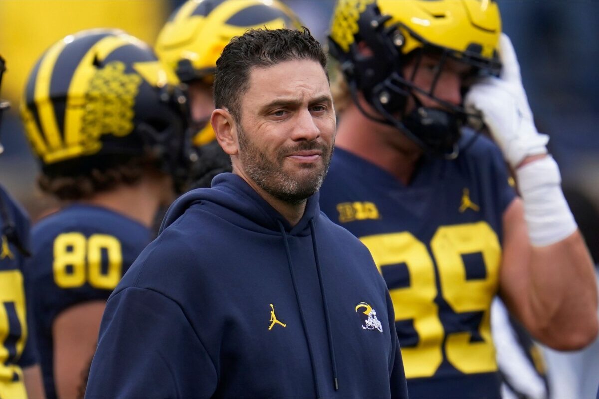 Former Michigan Coach Charged in Massive Student Account Hacking Case