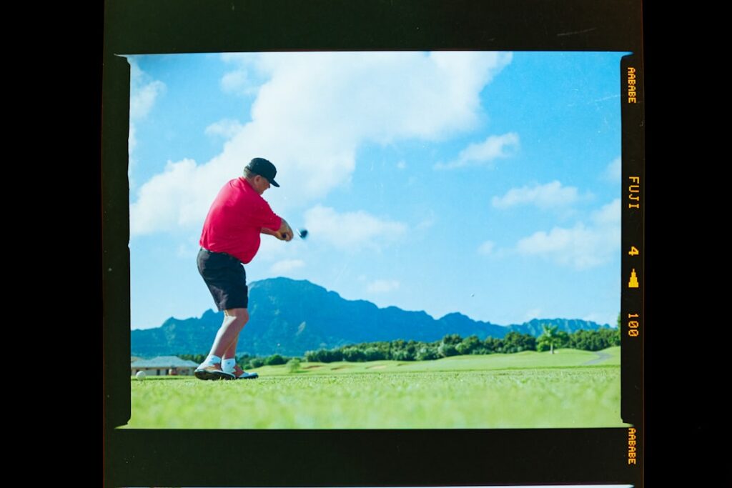 Television hosts and competitive golfers in a broadcast studio