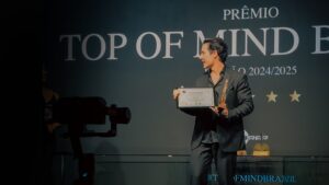 distinguished director in formal setting at ceremony