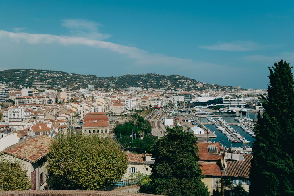 Cannes rooftops and harbor overlook the Mediterranean