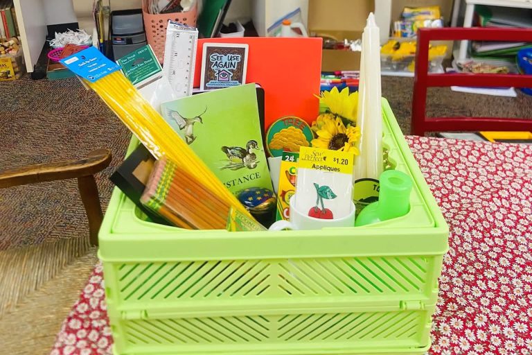 Reusable craft supplies displayed in a green crate at See Use Again